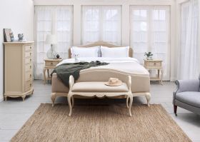Ivory distressed upholstered double bedframe available at Lee Longlands
